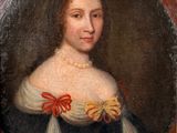 portrait of a lady in a blue dress with a red bow