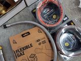a box of hoses and a box of hoses on the floor