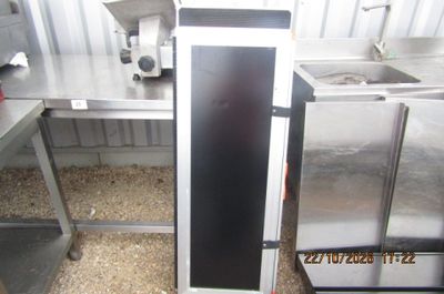 a silver refrigerator sitting in the middle of a kitchen