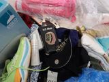 a pile of clothing and other items that are in a pile