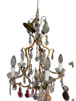 un lustre à pampilles à 5 bras de lumière en laiton et crist…