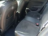 two seats in the back of a car that are empty