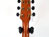 a close up of the headstock of a guitar on a white background
