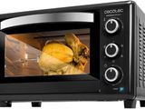 an image of a black toaster oven with a chicken in it
