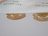 a pair of scissors that are laying on a piece of paper