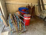 a garage with a lot of tools and a fire hydrant in it
