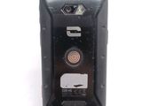 an image of a cell phone with a button on it