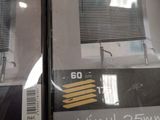 two packages of window blinds on display in a store