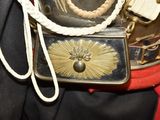 a close up of a belt with a gold star on it