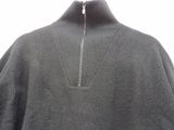 a close up of a sweater with a zipper on it