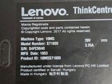 the back of a laptop with a lenovo thinkcent label on it