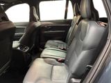 the back seats of a car are empty in the car