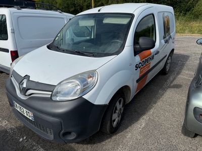 a white van that is parked in a parking lot