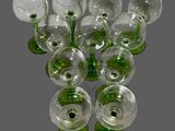 a lot of wine glasses that are sitting on a table