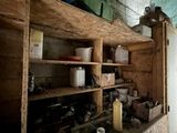 a small kitchen with a lot of items on the shelves