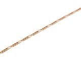 a close up of a gold chain bracelet with a heart on it