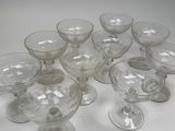 a lot of empty wine glasses sitting on a table