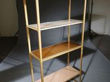 a wooden shelf with a glass top in a room