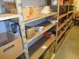 many boxes and boxes on the shelves in the room