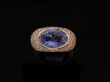 an oval tanzane sapphire and diamond ring