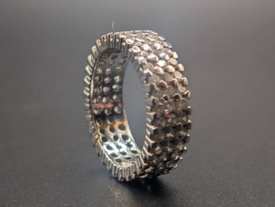 a close up of a ring on a table