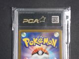 a close up of a pokemon card in a plastic case