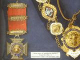 a display case with a lot of medals on it