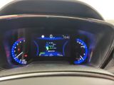 the dashboard of a car with a digital display on it