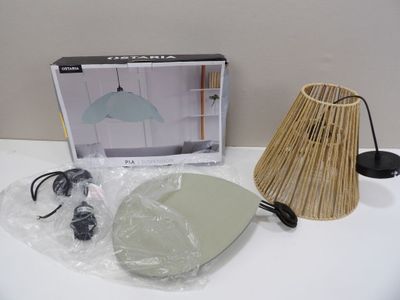 a picture of a table with a lamp and a mirror