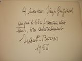 a handwritten poem on a piece of paper on a table