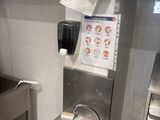 a stainless steel sink in a commercial kitchen
