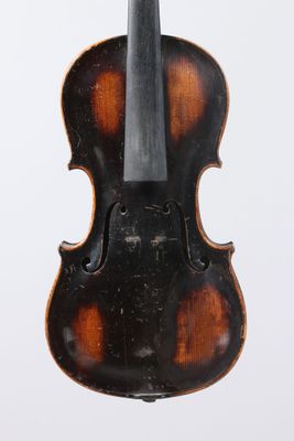 an antique violin with a wooden case and bow on a white background