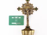 a cross and a credit card sitting on a table
