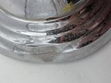 a close up of a metal object on a table