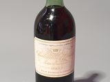 a bottle of wine that is sitting on a table