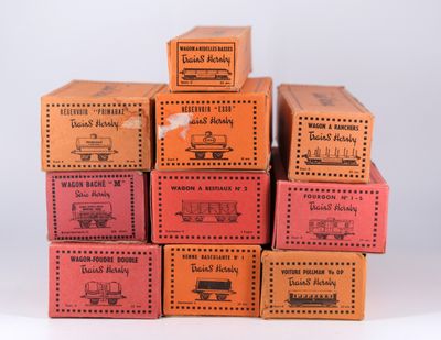six boxes stacked on top of each other on a table