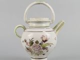 an image of a white teapot with flowers on it