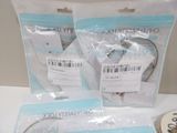 three bags of safety locks on a white table