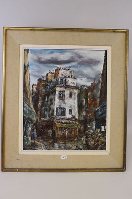 tableau encadré représentant une scène de rue avec un bâtiment en arrière-plan