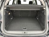 the back of a car with its trunk open showing the cargo area