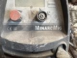 a machine that is sitting on the ground in the garage