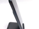 a close up of a cell phone on a stand