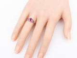 an image of a woman ' s hand with a ring on it
