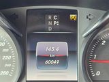a close up of a car dashboard with a speedometer