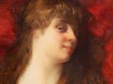 portrait of a woman with long hair and a red background