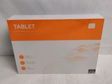 an orange and white box of a tablet on a white surface