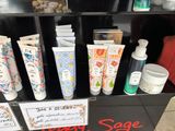 many different types of skin care products displayed on a shelf