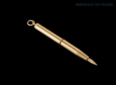 un gros plan d'un stylo sur fond noir