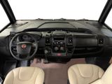 a view of the inside of a vehicle from the driver ' s seat