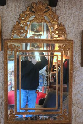 a man taking a picture of himself in a mirror